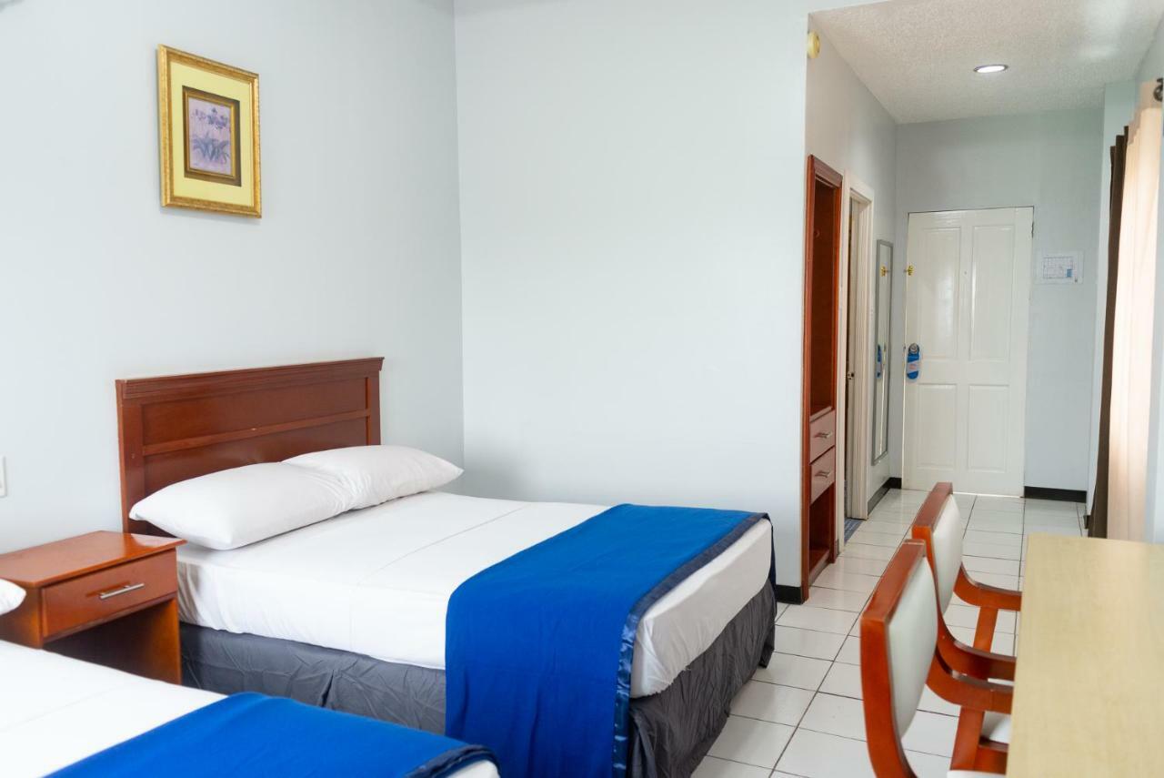 Status Hotel Georgetown Bagian luar foto