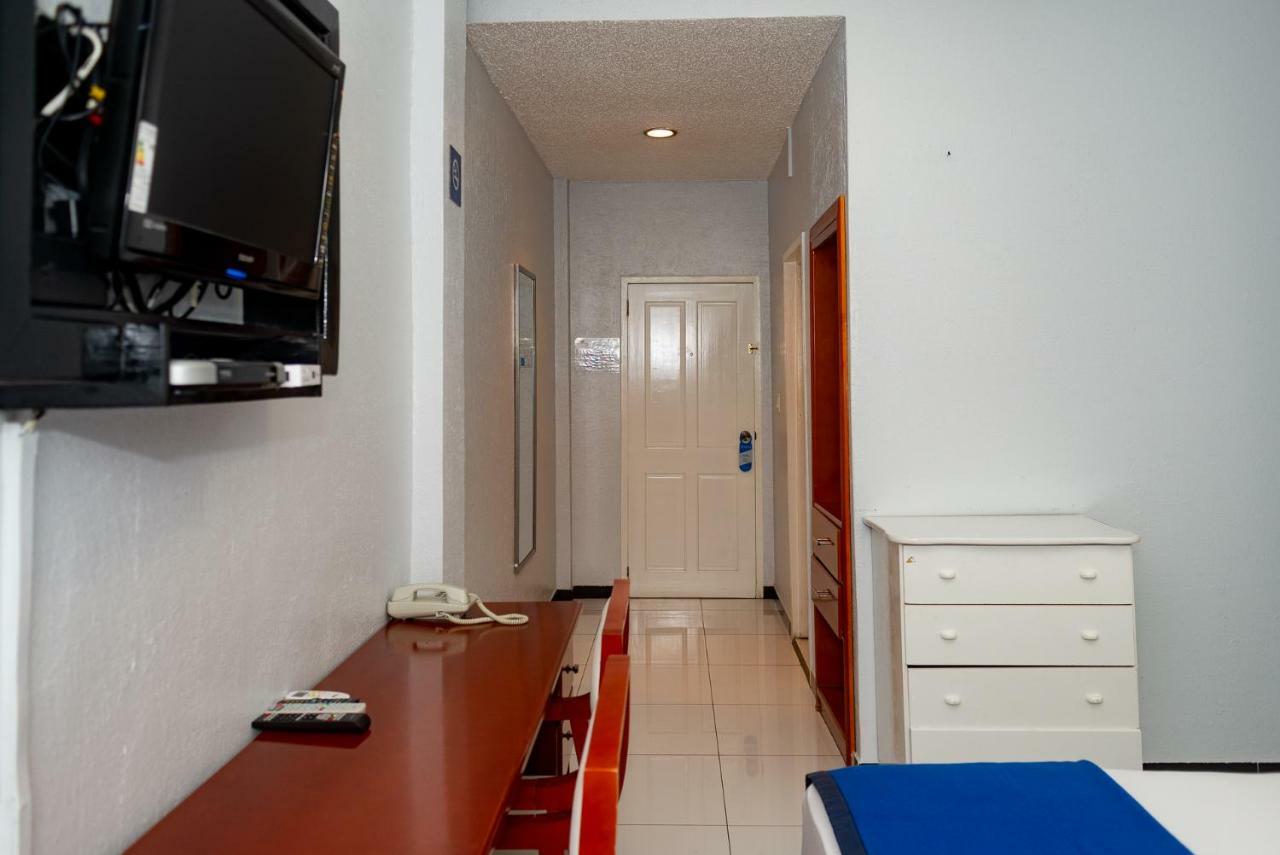 Status Hotel Georgetown Bagian luar foto